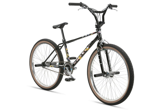 The Haro Bikes Lineage Ground Master 26 2023 is a black BMX bike with yellow graphics on a sturdy chromoly frame, featuring wide handlebars, a padded seat, and thick black tires with double-wall alloy rims. It is elegantly displayed against a plain white background.