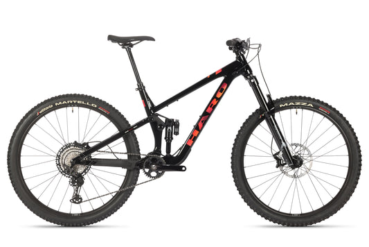 The Daley Alloy 1 is a black full-suspension all-mountain 29er with red HARO branding, aluminum frame, wide tires, and disc brakes.