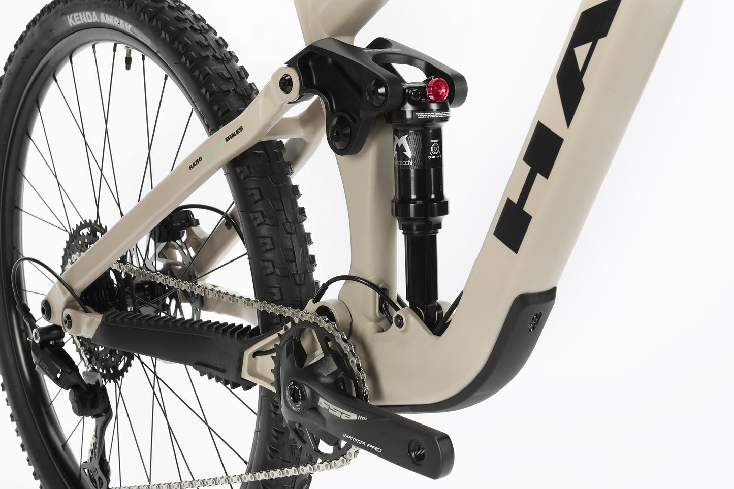 Close-up of the Daley Alloy 3’s rear suspension, crankset, aluminum frame, visible chain, and 29” rear wheel.