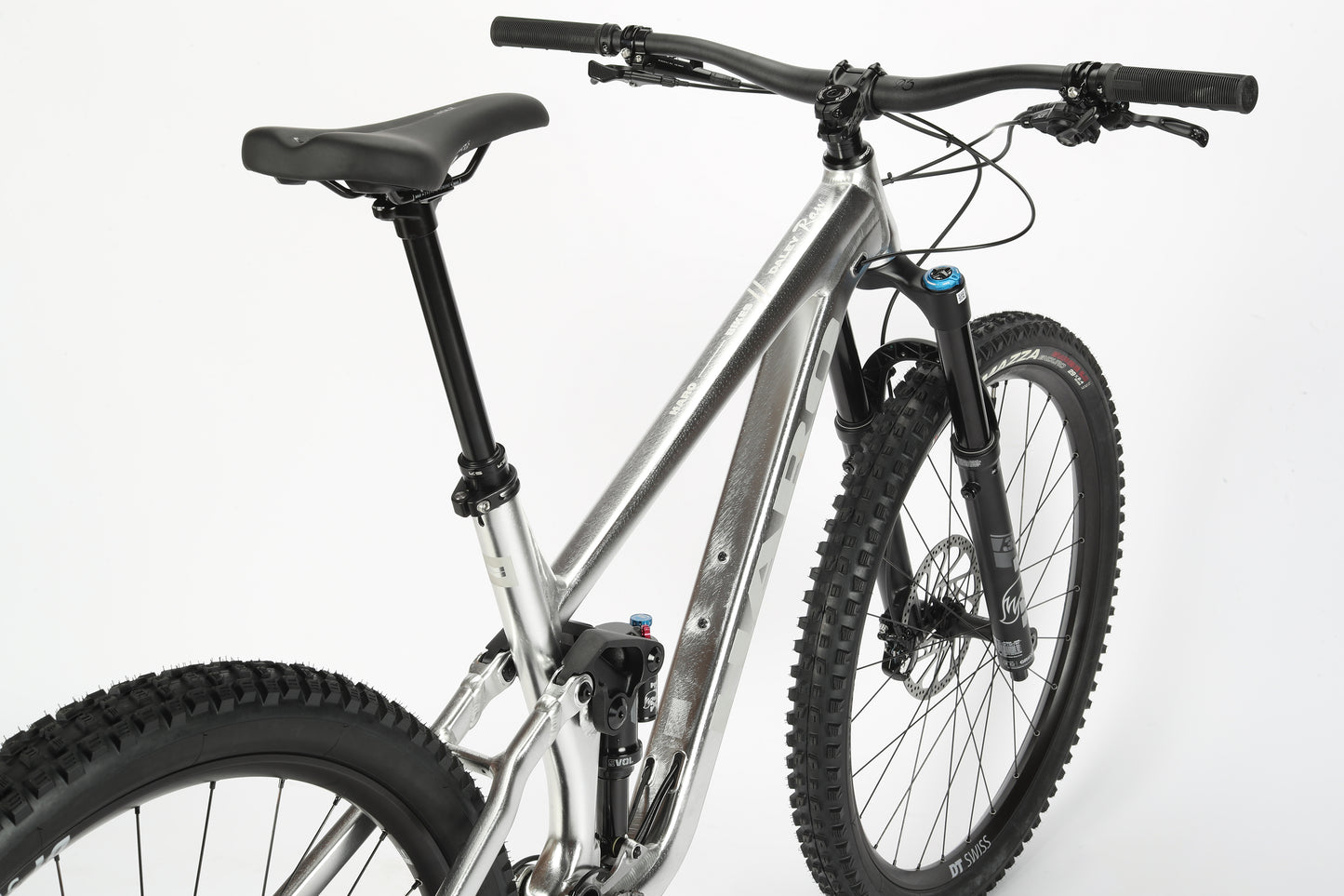 The Daley Alloy LTD 2 mountain bike features thick tires, Fox suspension, and flat handlebars, shown on a white background.