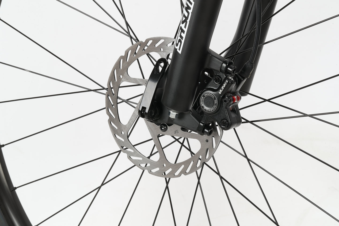Close-up of the Flightline 1 29 hardtails wheel, showing its disc brake rotor, hydraulic brakes, and caliper on a white background.