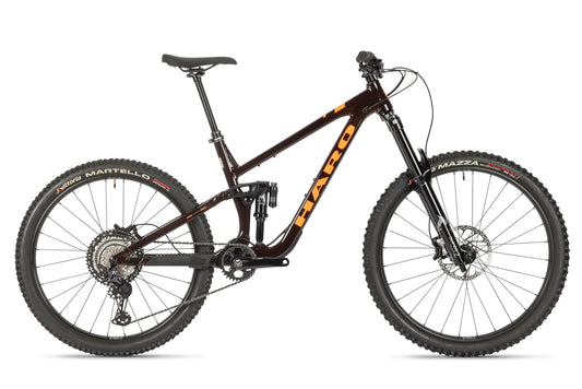 The Greer Alloy 1 is a full-suspension mountain bike with progressive suspension, knobby tires, disc brakes, and HARO branding.