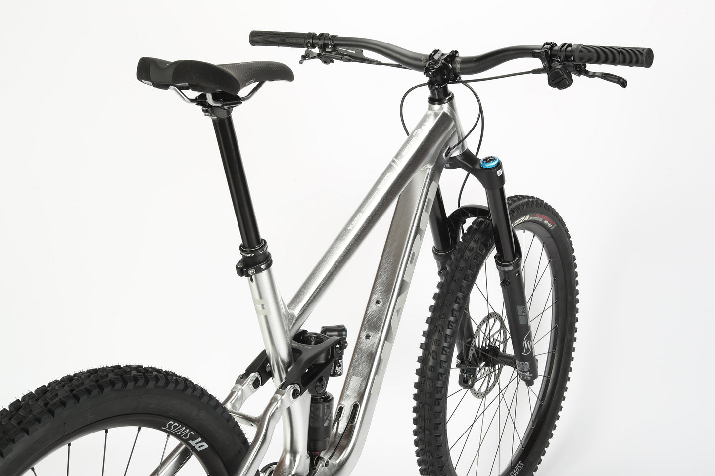 A Greer Alloy LTD 1 full-suspension MTB with Fox suspension, wide handlebars, and thick tires on a white background.