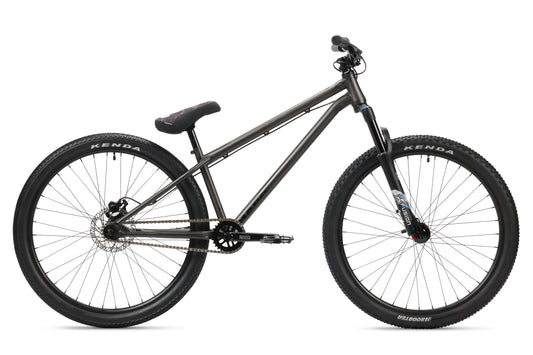 Steel Reserve 2 dirt jumper with chromoly frame, large tires, sloped top tube, front suspension, no front brake, side view.