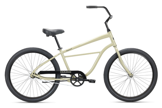 The Tradewind HD by Haro Bikes features a durable aluminum frame, black seat, and handlebars. Its large black tires and single gear create a simple, classic design. This rust-resistant cruiser bicycle is ideal for casual rides with timeless style.
