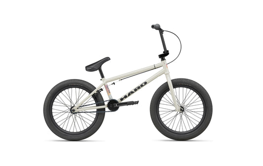 The Haro BLVD BMX in white with black wheels, handlebars, and seat is shown in profile on a white background.