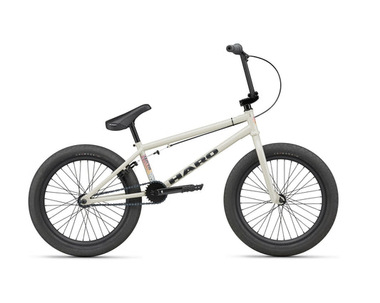 The Haro BLVD BMX in white with black wheels, handlebars, and seat is shown in profile on a white background.