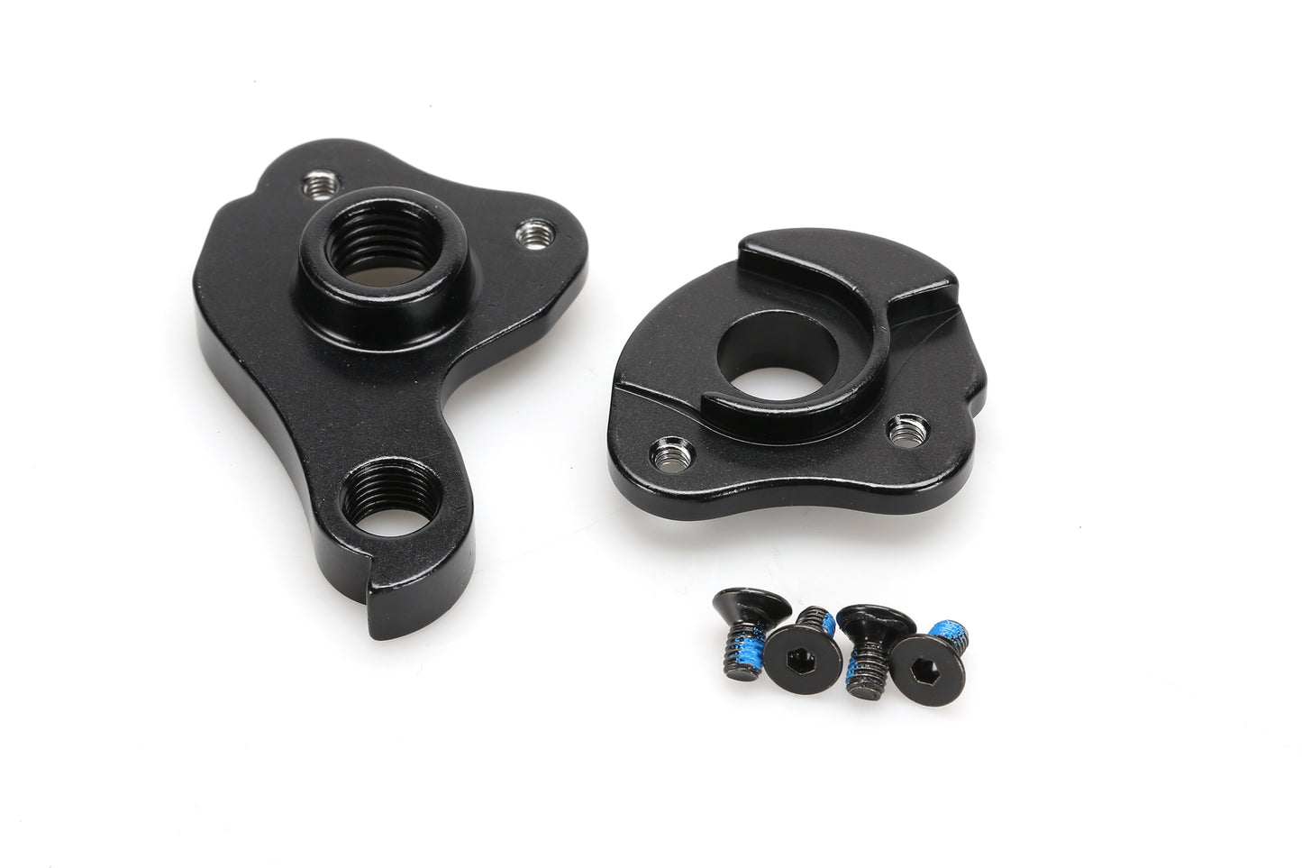 Two gleaming black metal Hanger Masi Vincere components from Masi Bikes with various shapes and holes, accompanied by four small screws, are placed on a white background.