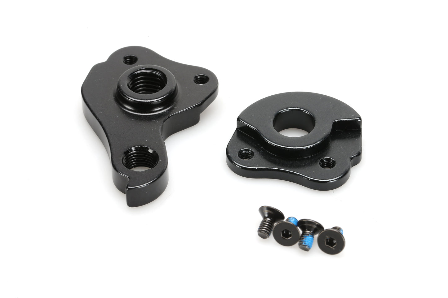 The black metal mechanical parts, featuring a GRX11 derailleur hanger with threaded holes and three small screws with blue tips, are showcased on a white background. This product is named Hanger Masi Brunello 2022 by Masi Bikes.