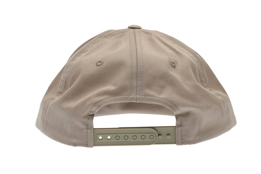 The image shows the back view of the Vato Snap Back Hat by Premium, a beige unstructured baseball cap with a cool style. It features an adjustable green plastic strap with multiple holes.