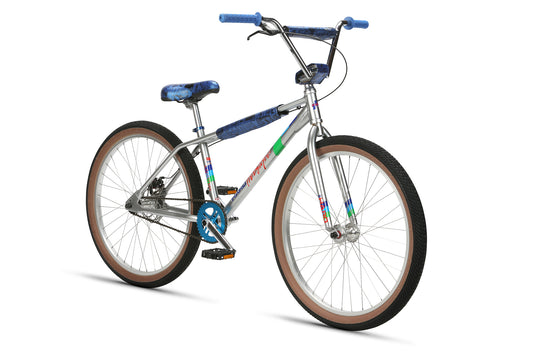 The Bob Haro Freestyler 26 BMX features blue grips, blue saddle, tan sidewall tires, and a freestyle frame from a front angle.