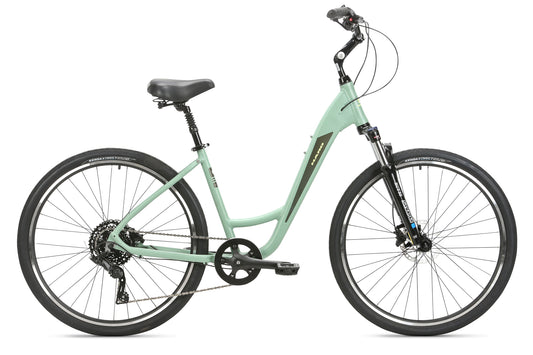 The Haro Bikes Flow 3 Step Thru, in mint green, features a step-through frame with easy gears. It offers a black seat, suspension fork, disc brakes, wide black tires, and ergonomic handlebars for smooth and comfortable rides.