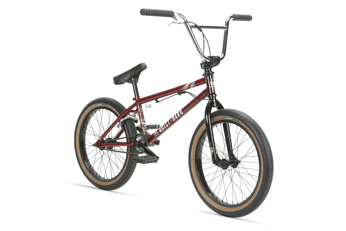 A maroon Quist Freestyle BMX bike with black handlebars, black seat, and tan-walled tires on a white background.