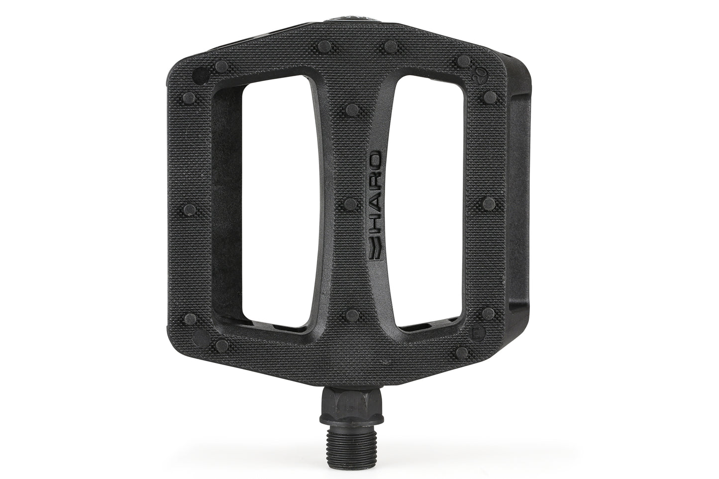 The Baseline Plastic Pedals by Haro Bikes are black, rectangular pedals with a textured surface and a chromoly spindle for secure attachment, featuring the Haro brand name and extra grip for improved stability.