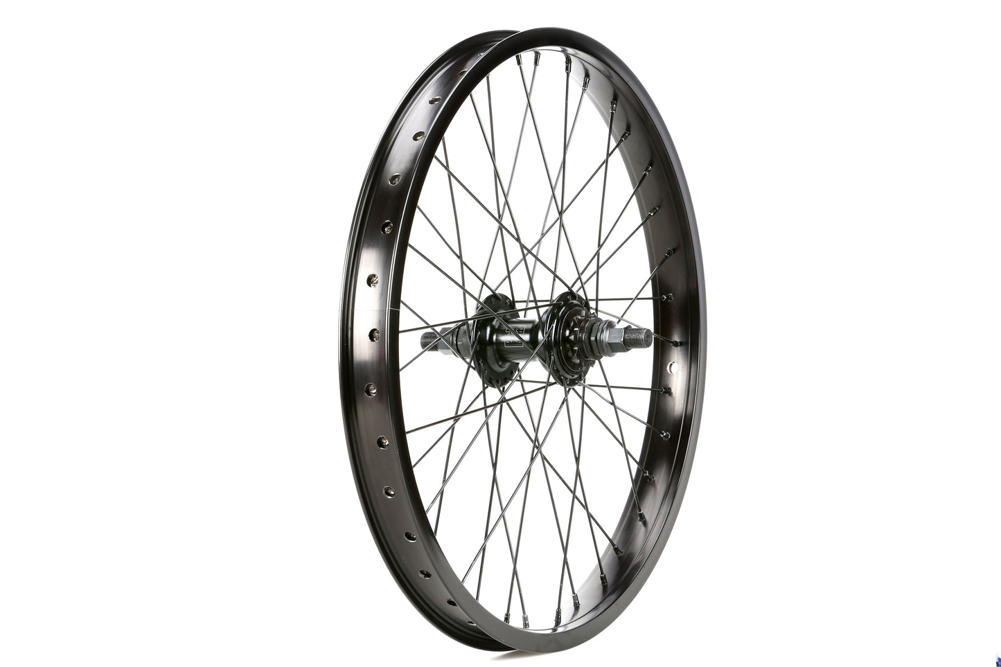 The Baseline Cassette Wheel from Haro Bikes features a durable double-wall rim, metal spokes, and a sealed bearing hub with an axle. It stands upright on a white background, highlighting its sleek industrial design and frame attachment holes.