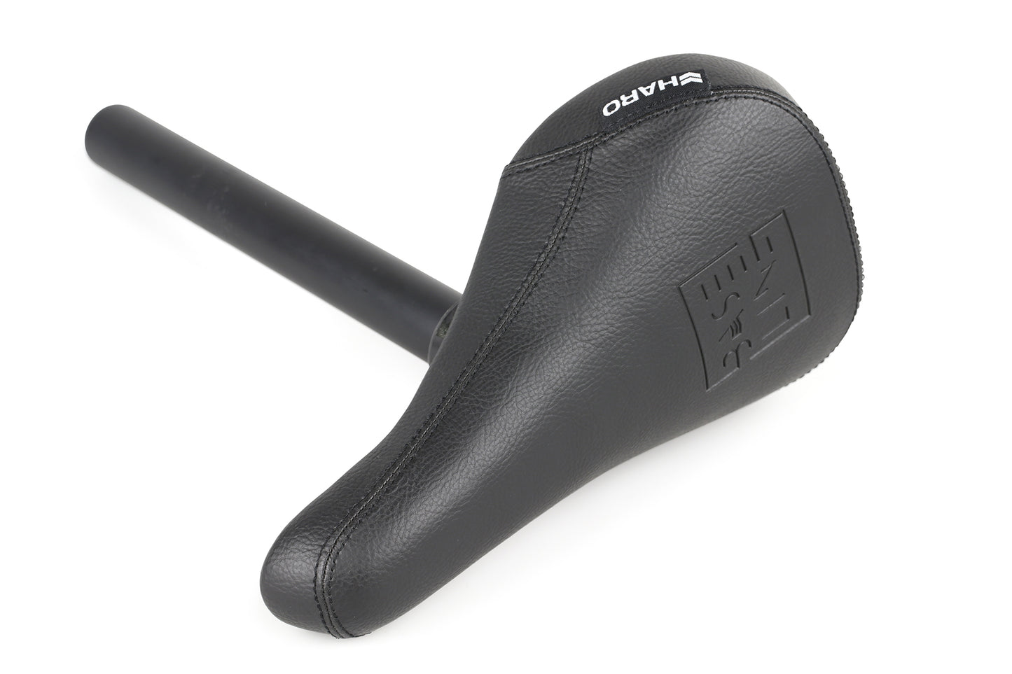 Close-up of the Baseline Standard Seat/Post Combo by Haro Bikes, featuring a synthetic leather cover. The black seats smooth, textured surface showcases a simple yet functional design ideal for BMX applications.