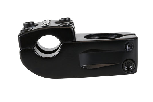 Close-up of the Baseline Top Load Stem by Haro Bikes, with angled edges and bolt holes for attachment. Designed for securing handlebars to the steering tube, it features an anti-pinch steerer and a matte finish. This affordable stem offers multiple connection points for enhanced stability.