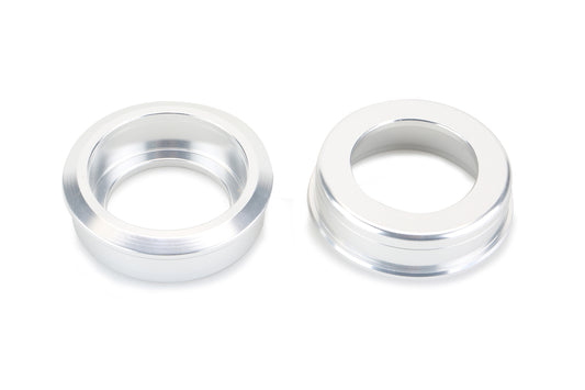 Two sleek, silver metallic rings called Fusion BB Cups by Haro Bikes are aligned on a plain white background, featuring smooth surfaces and central hollows similar to USA BB shells.
