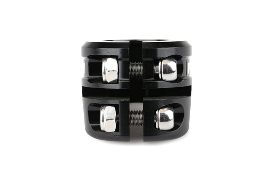 Close-up of a Haro Bikes Fusion Twin Torque Seat Clamp reveals two silver bolts and nuts. This black metal clamp secures cylindrical objects like seat posts, with its double pinch bolt system highlighted against a white background.