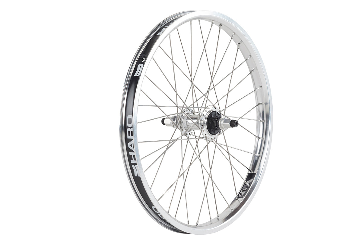 A Haro Bikes Sata Rear Wheel, silver with a proprietary rim shape and sealed alloy hubs, displays Haro on the rim and is upright against a white background.