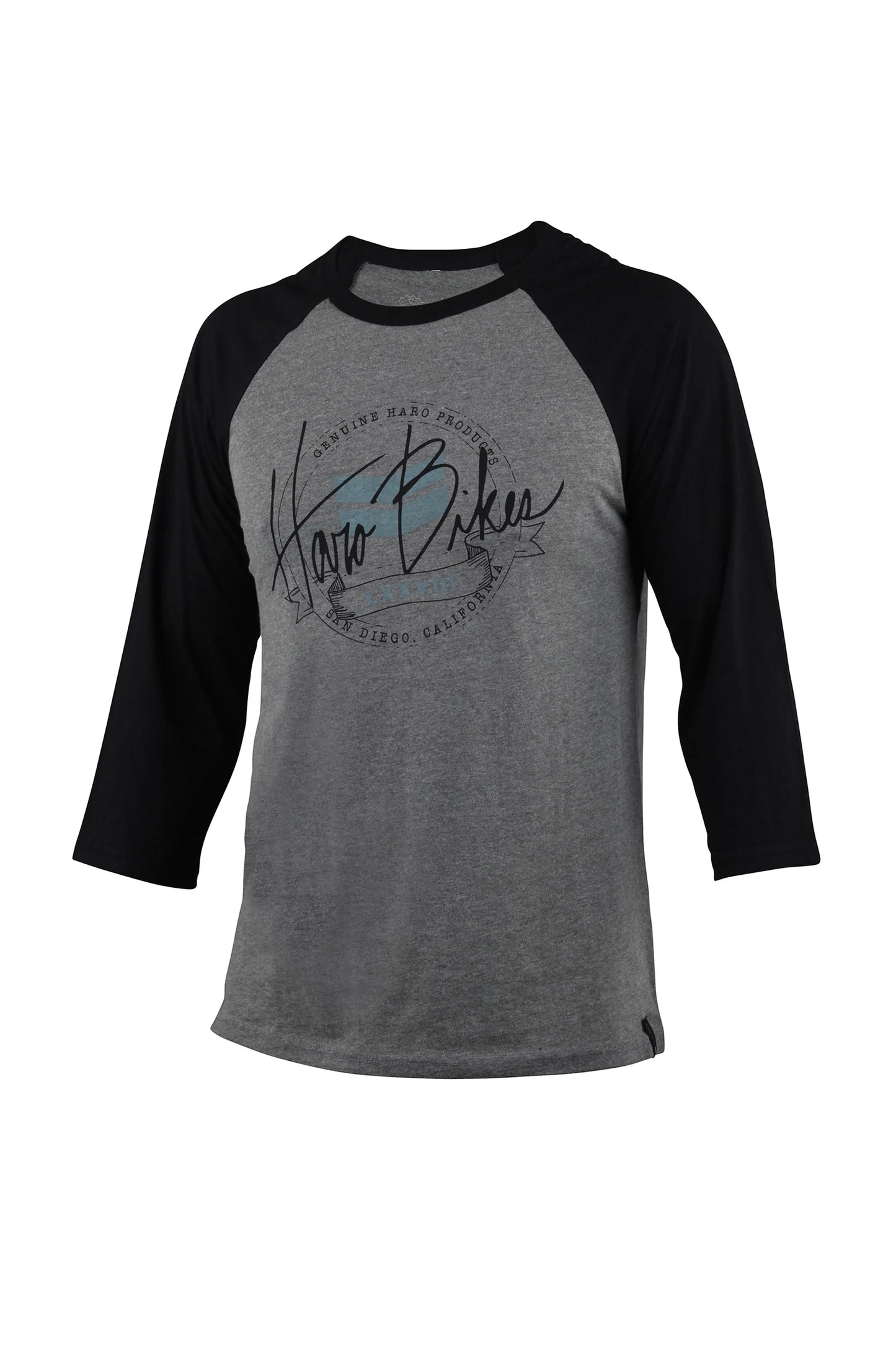 The Raglan Stamped Grey by Haro Bikes is a lightweight, gray and black three-quarter sleeve tee featuring a circular graphic and Haro Bikes in casual script on the front, crafted from soft combed cotton for maximum comfort.