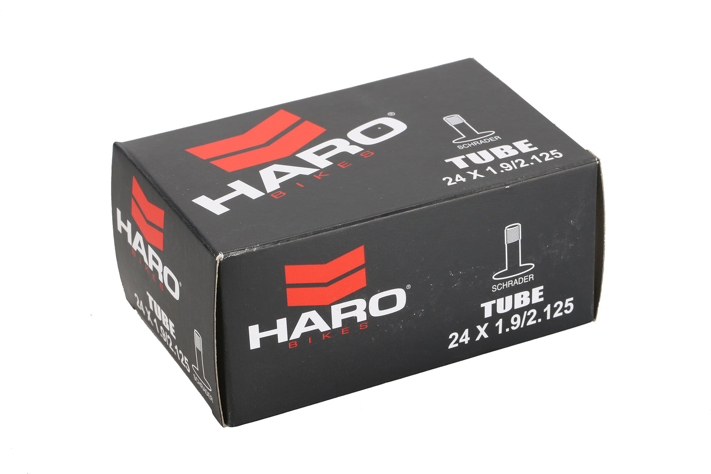 A sleek black box, marked with red and white text, displays Haro Bikes Schrader Tube 24 x 1.9/2.125, ideal for any 24-inch tire. It features a bold red stylized “H” logo and includes a Schrader valve for easy inflation.