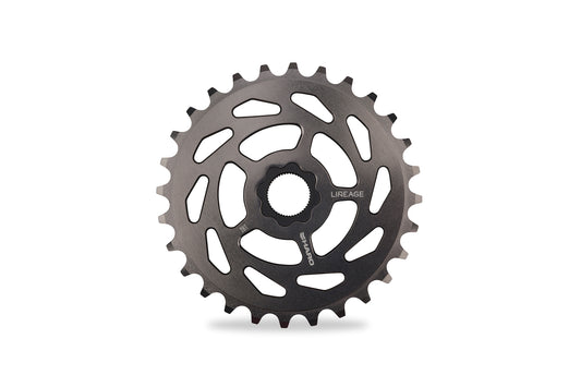 The Haro Bikes Lineage Spline Drive Sprocket, in black, features numerous teeth and a central attachment hole. Its made from CNC machined aluminum, has weight-reducing cut-outs, includes a 48-spline insert, and displays LINEAGE on its surface.