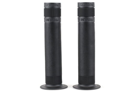 Two Premium Team Grip Flange bicycle handlebar grips stand upright. Made of durable Krayton rubber, they feature a ribbed texture and mushroom pattern for improved hold, with PREMIUM PRODUCTS embossed on both flanged ends. Each grip flares outward slightly at the base.