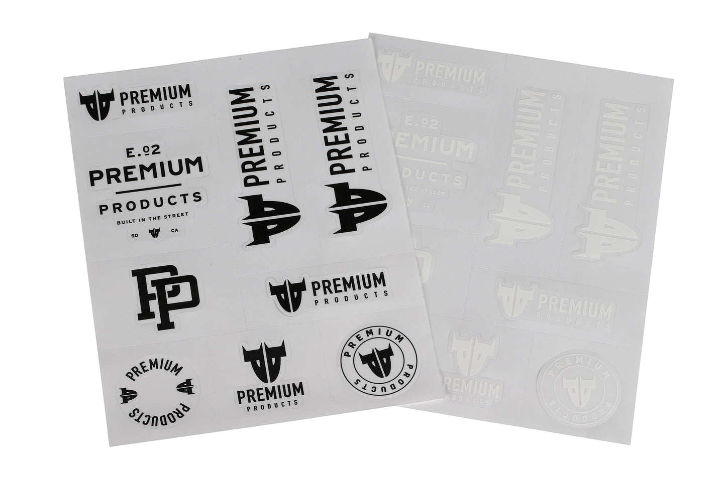 Transparent Premium *Sticker Sheets* by the brand Premium, showcasing various logos in black and white. The designs feature text and stylized initials with diverse fonts and shapes.