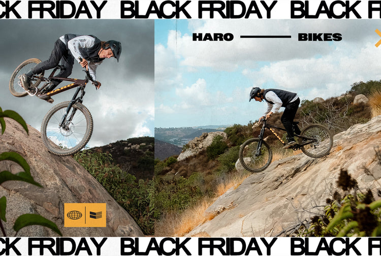 Two people ride mountain bikes down rocky hillsides under a blue sky. The image features BLACK FRIDAY and HARO BIKES text, with logos and a natural outdoor landscape in the background.