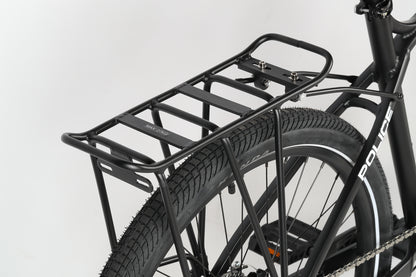 Close-up of a black Haro MTB PD1 27.5 police bike with a rear cargo rack above the wide-tread tire, displaying Police on the frame against a plain white background.