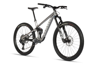 The Daley Alloy LTD 1 by Haro MTB is a limited edition silver mountain bike with a sturdy frame, front suspension fork, knobby tires for off-road cycling, disc brakes, and a black saddle featuring Haro Daley Alloy branding.