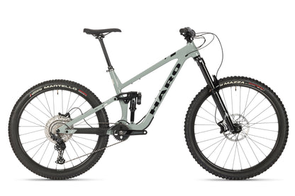 A gray Haro MTB Greer Alloy 2 mountain bike, with a performance alloy frame and full suspension, features thick off-road tires, a mullet wheel configuration, HARO branding, and disc brakes on a white background.