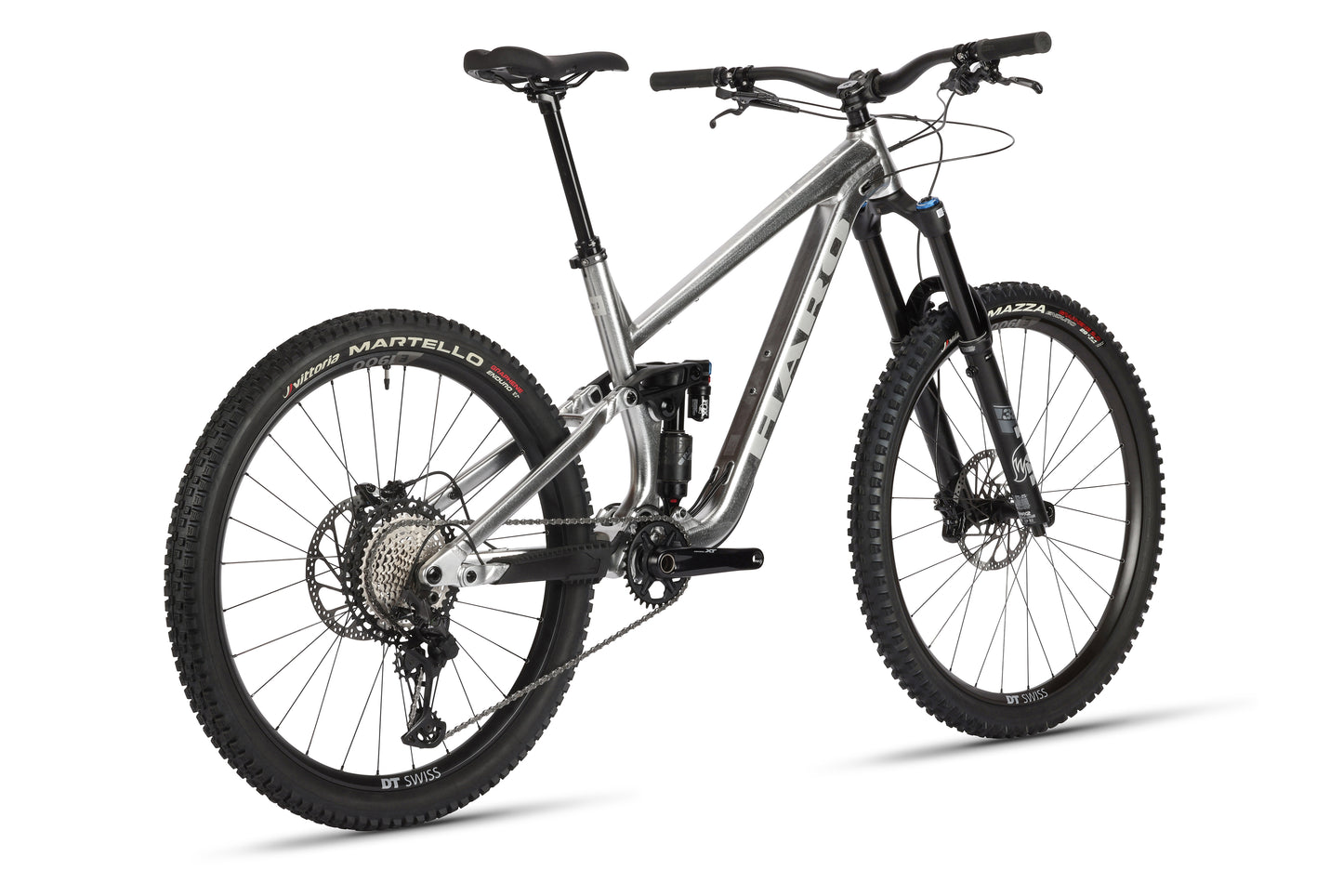 The Haro MTB Greer Alloy LTD 2 is a full-suspension mountain bike featuring a sleek aluminum frame, large Martello black tires, a black seat, and Fox suspension for smooth rides. Its designed to highlight its impressive features and components.