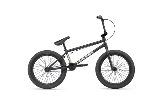 The Haro BLVD BMX bike in black features thick tires and a padded seat, built for all-around performance, shown on white.