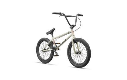 The BLVD BMX bike in beige with black handlebars, seat, and tires delivers all-around performance on a white background.