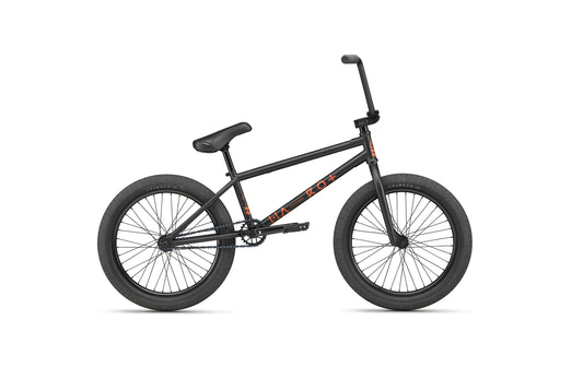Burgess BMX bike with thick tires, straight top tube, and upright handlebars—built for high-level riding.