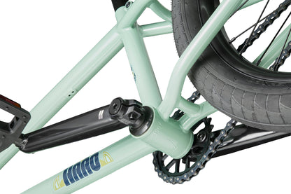Close-up of the Burgess bike frame highlighting the pedal crank, chain, and rear wheel.