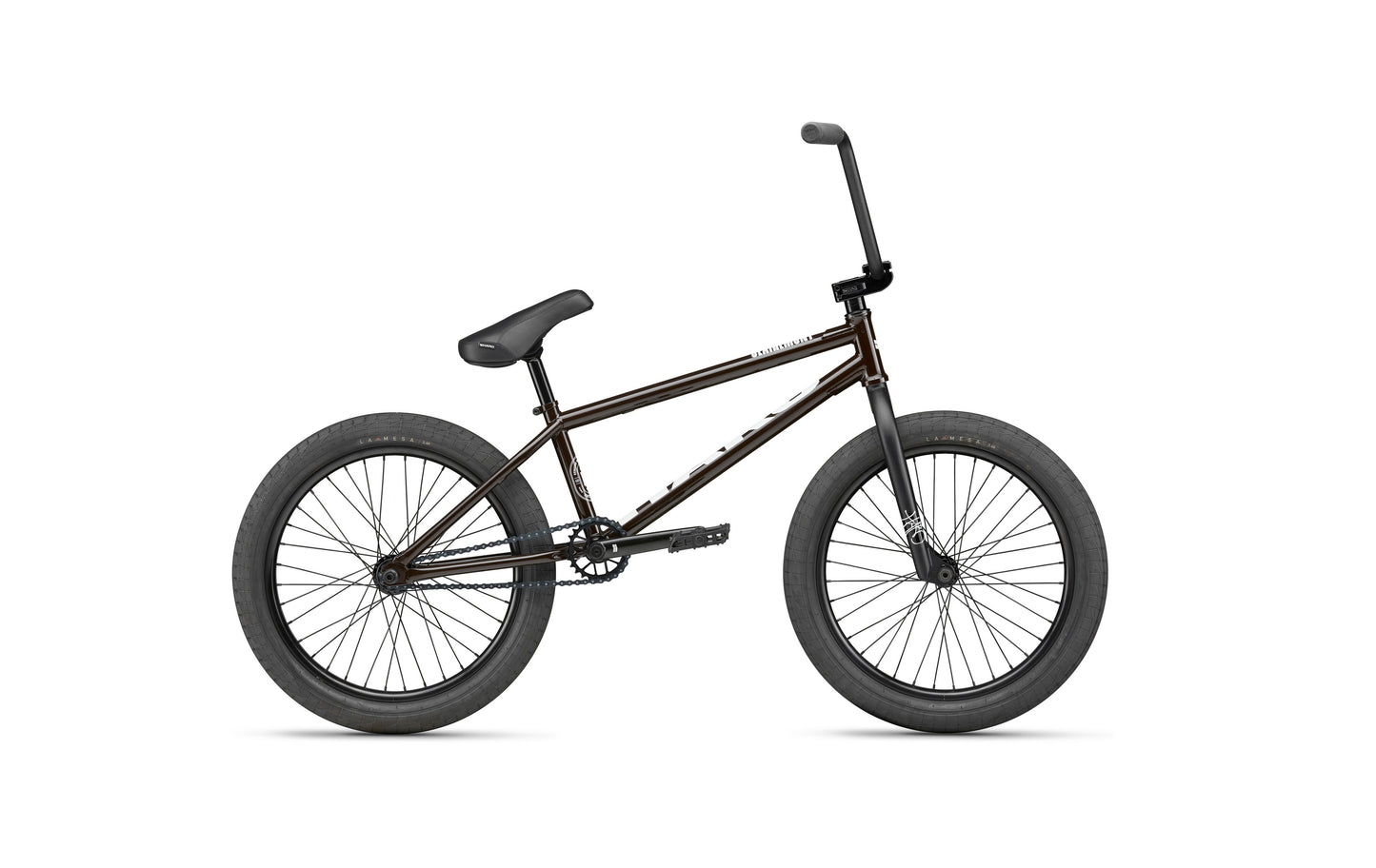 The Clairemont is a black park BMX bike with thick tires and a brown frame, shown from the side on a white background.