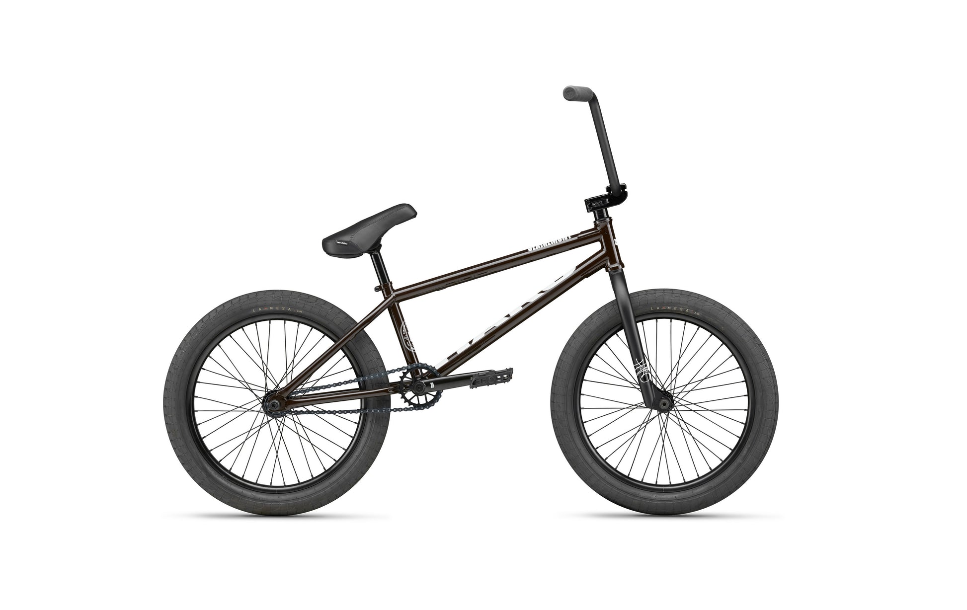 The Clairemont is a black park BMX bike with thick tires and a brown frame, shown from the side on a white background.
