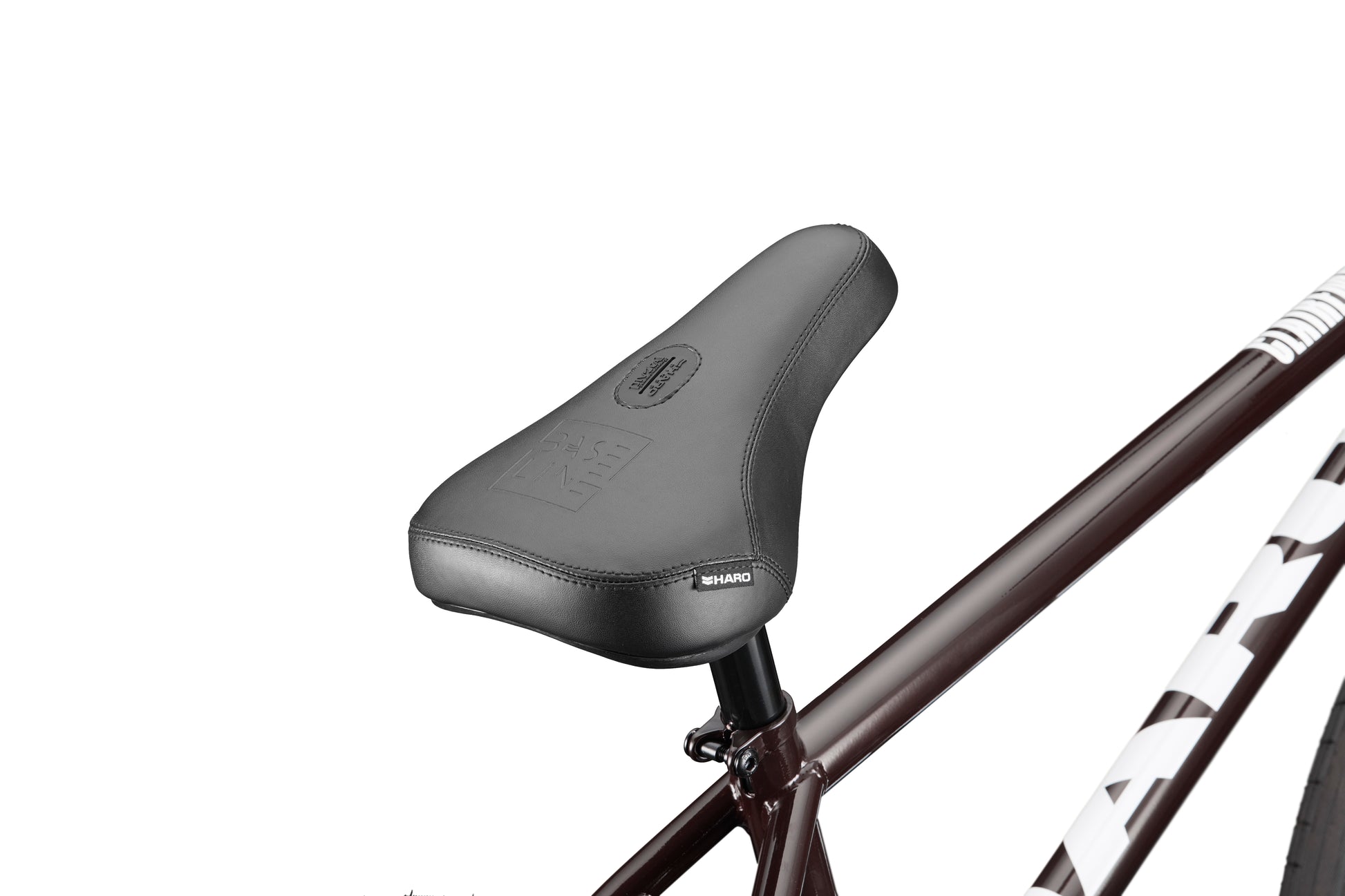 Close-up of a black competition-ready bike seat on the maroon Clairemont against a white background.
