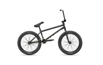The Dana is a black Haro street bike with thick tires, padded seat, and straight handlebars on a white background.
