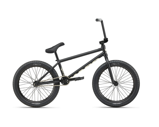 The Dana is a black Haro street bike with thick tires, padded seat, and straight handlebars on a white background.