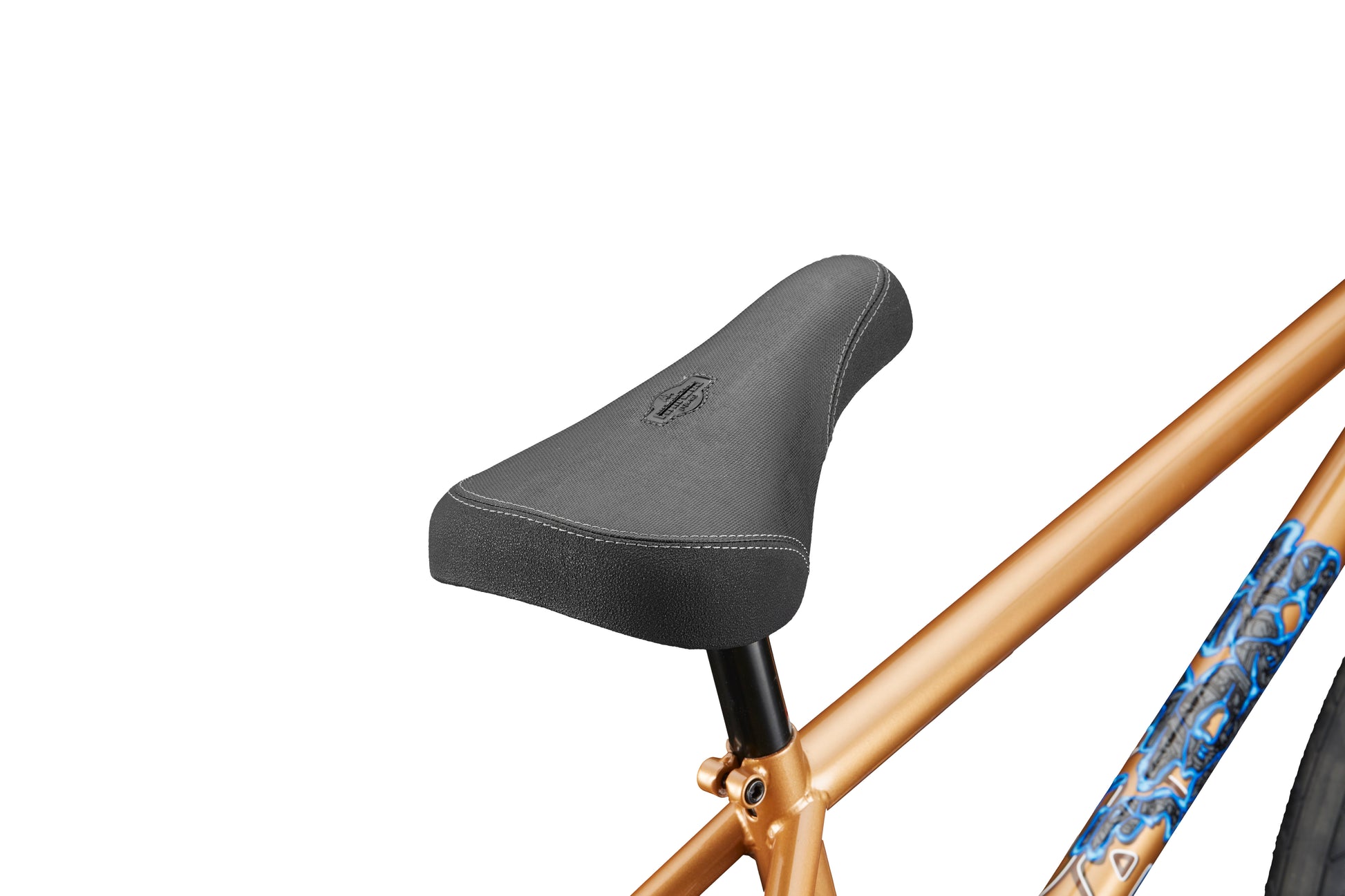Close-up of a black seat on the gold Dana bike frame with blue and white custom colorways.