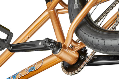 Close-up of Dana’s crankset and rear wheel, built for pro-level street performance and bold BMX style.