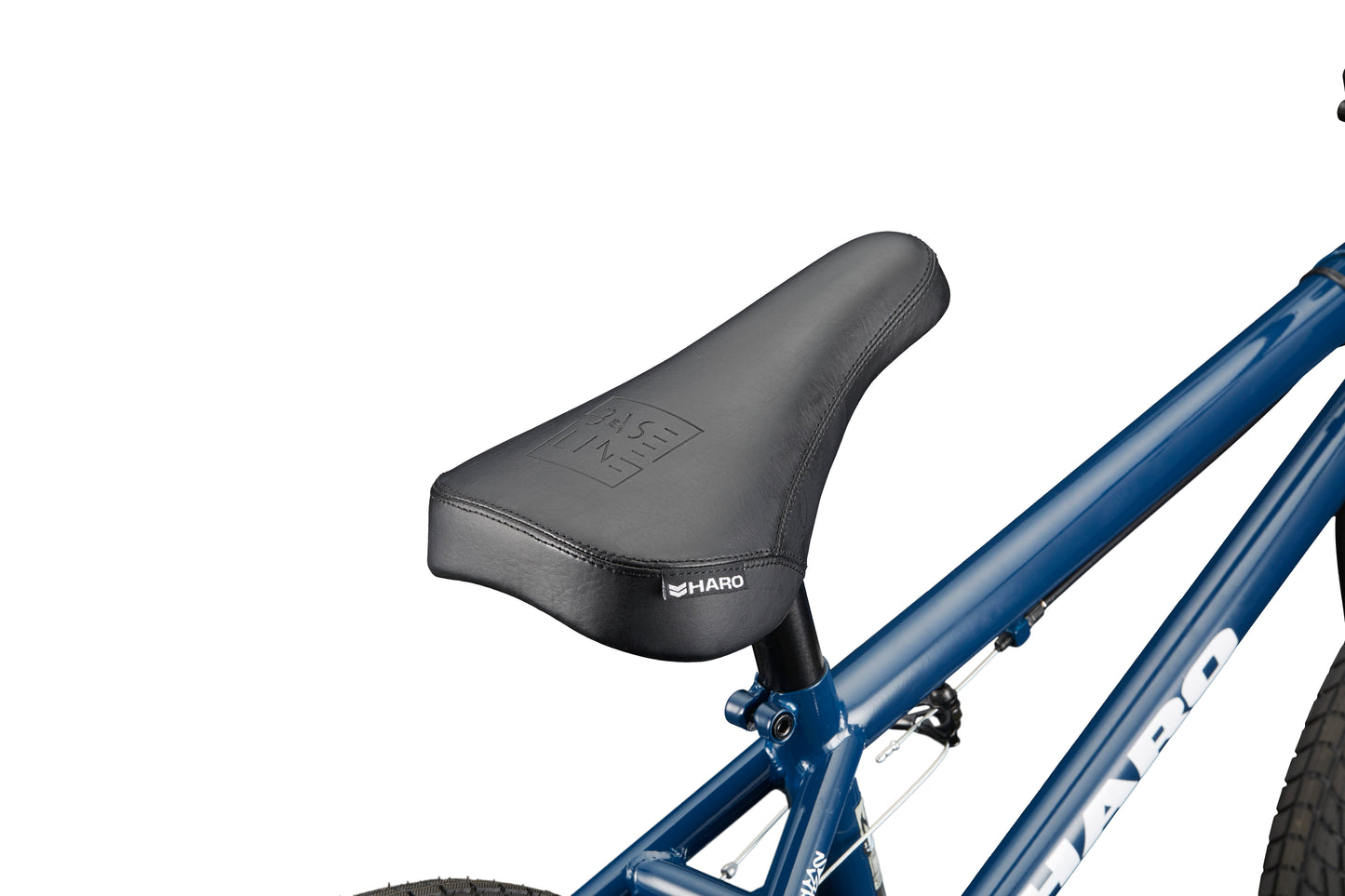 Close-up of a black BMX seat on the Downtown 16 bike with a blue frame, shown against a white background.