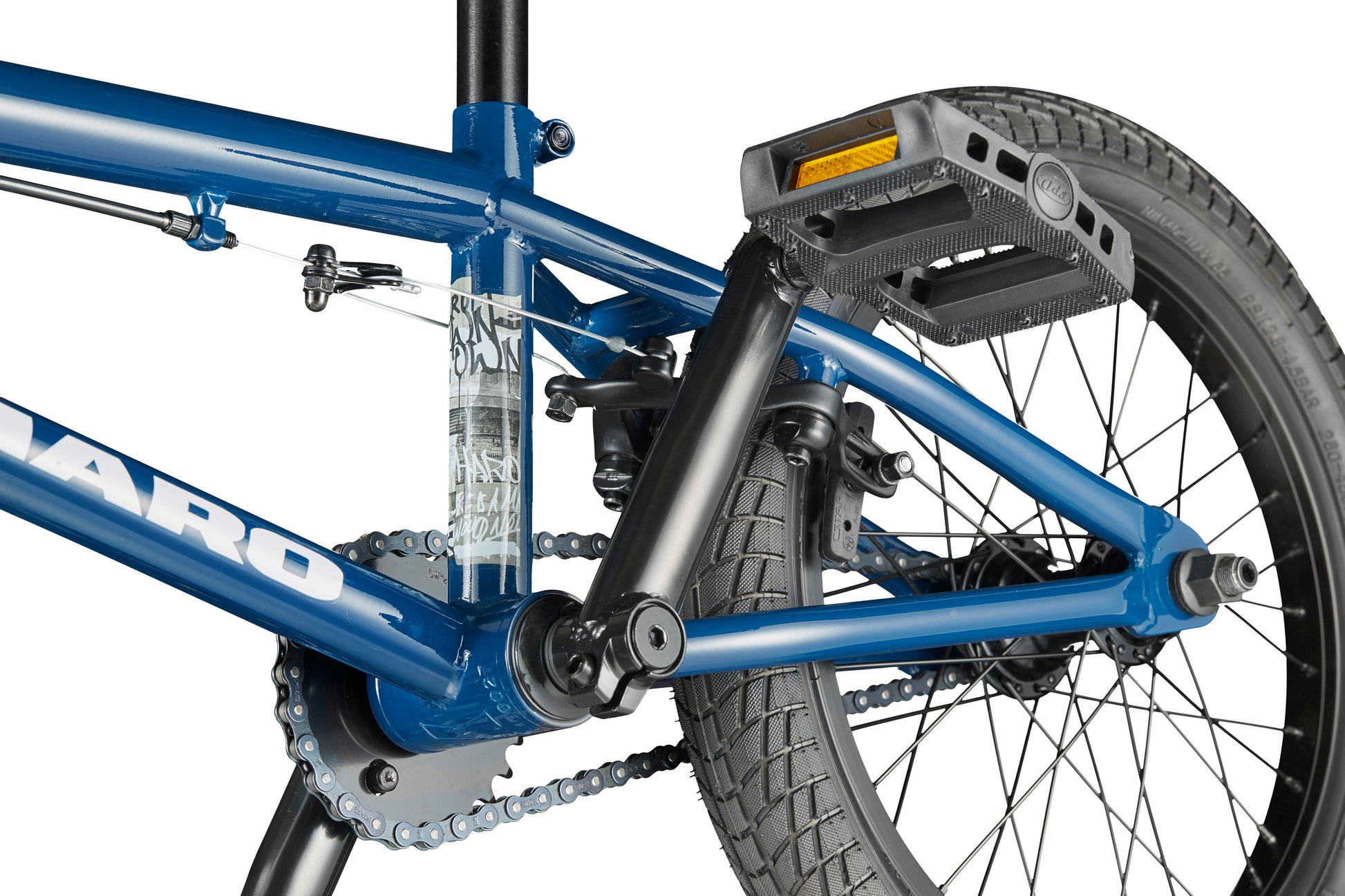 Close-up of the Downtown 16’s blue frame, crank, pedal, and rear wheel showing detailed tire tread and chain.