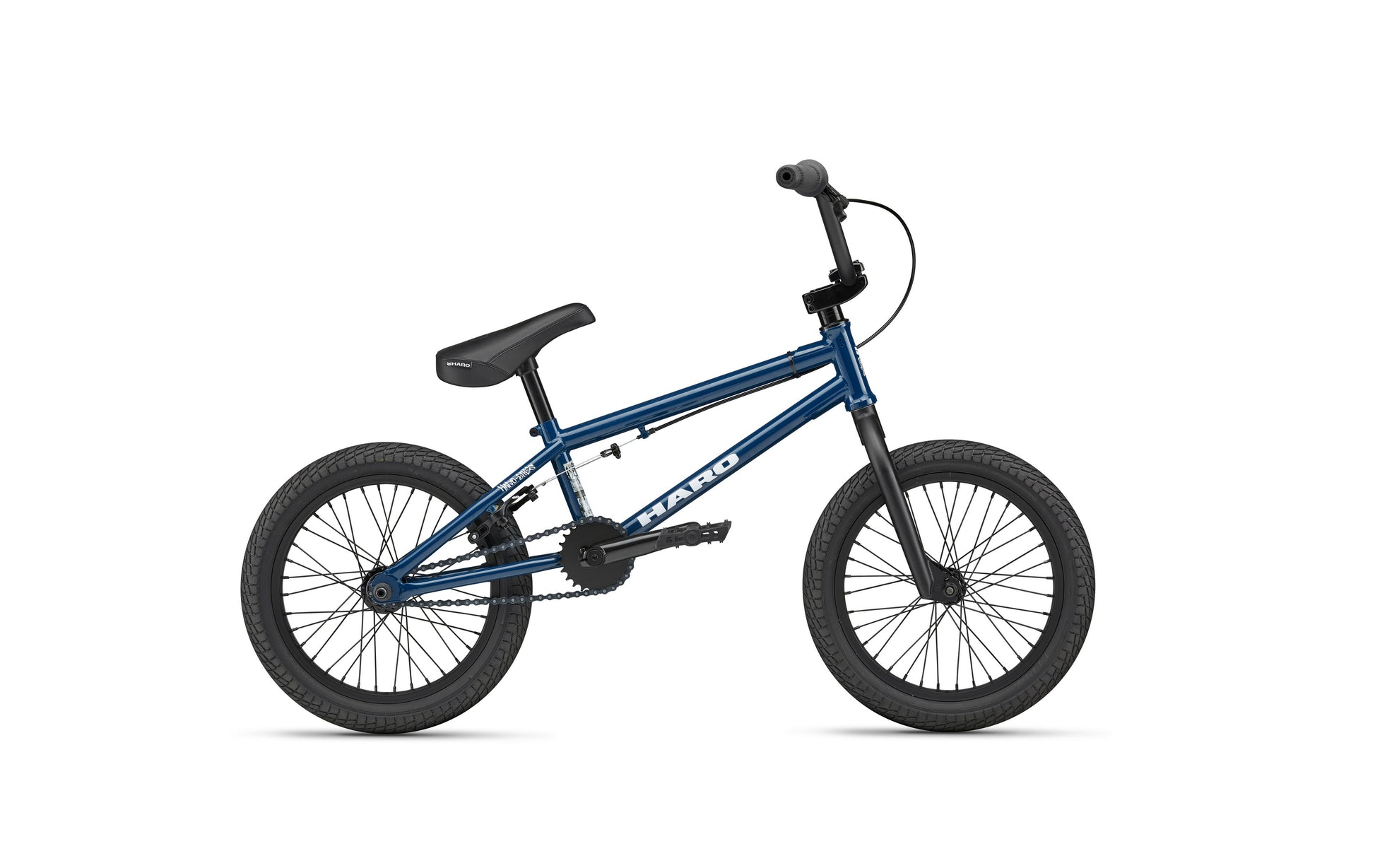 The Downtown 16 is a blue BMX-style bike with black tires and seat, ideal as a first bike, shown on a white background.