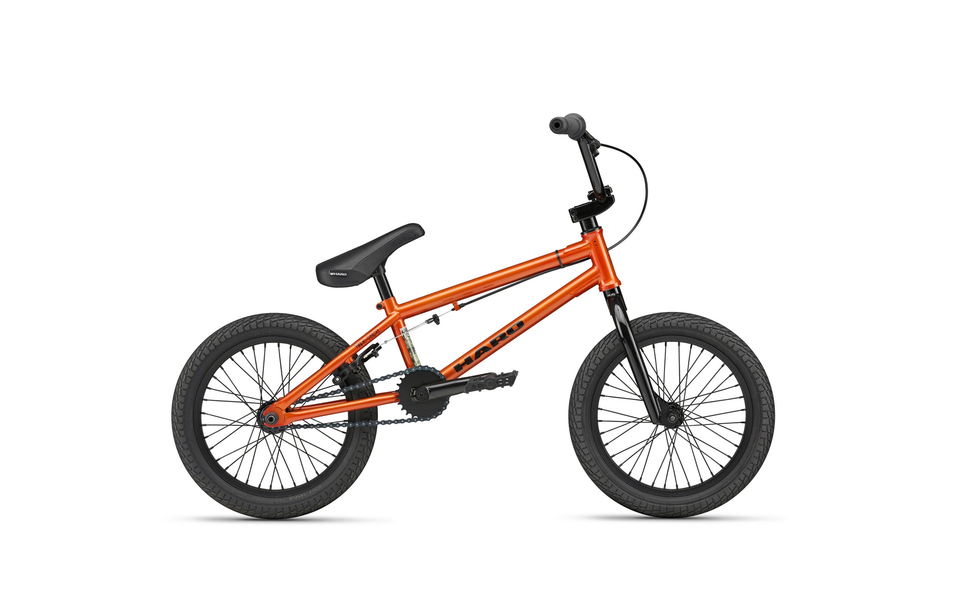 The Downtown 16 is a small orange BMX bike with black tires, seat, and handlebars, shown side-on against a white background.