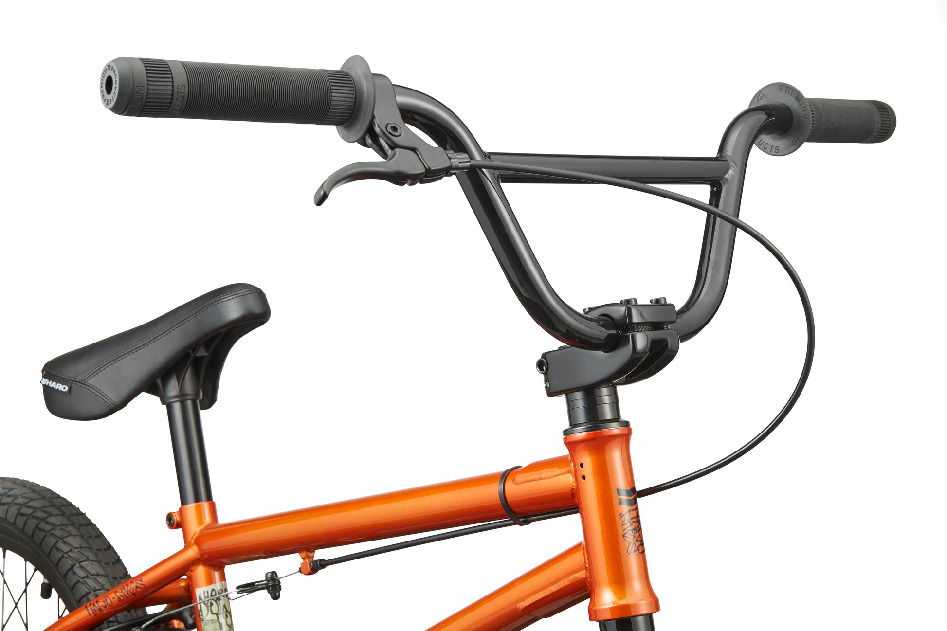 Close-up of a Downtown 16 BMX bike showing its seat, handlebar with brake lever, and front wheel—great for first-time riders.